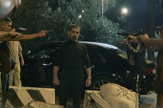 Erdal Yildiz as Hassan Al Walid in "Crooks"