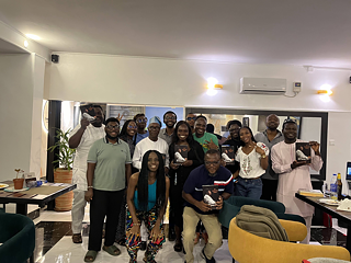The Book Club Lagos members holding up My transition hours