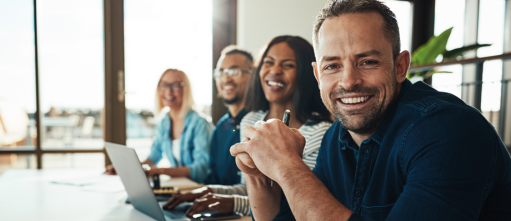 A diverse group of people in a modern office setting