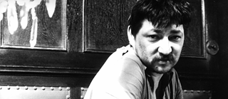 Schwarz-Weiß Porträit von Rainer Werner Fassbinder