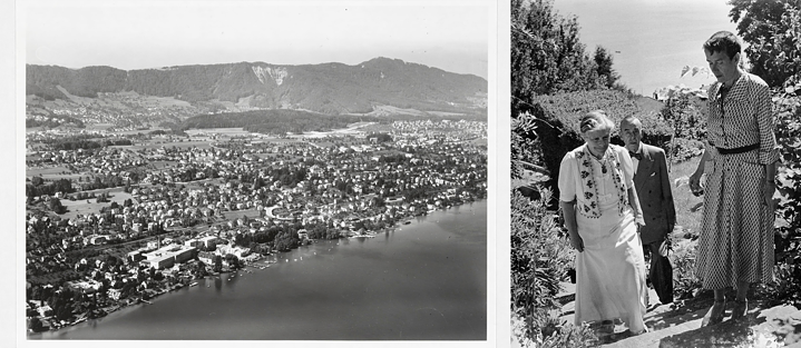Eine zweigeteilte Darstellung. Links eine Luftaufnahme der Stadt Stadt Kilchberg am Zürichsee, mit zahlreichen Gebäuden und Häusern, im Hintergrund Hügel. Rechts Erika, Katia und Thomas Mann, die auf einem Pfad in ihrem Garten gehen, gekleidet in Kleidung, die auf die 1950er Jahre hinweist. Im Hintergrund der Garten des Hauses und der Zürichsee in der Ferne.