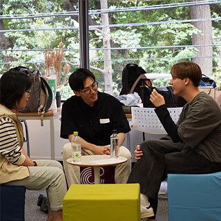 three people talking