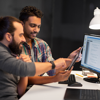 Creative Team with Tablet