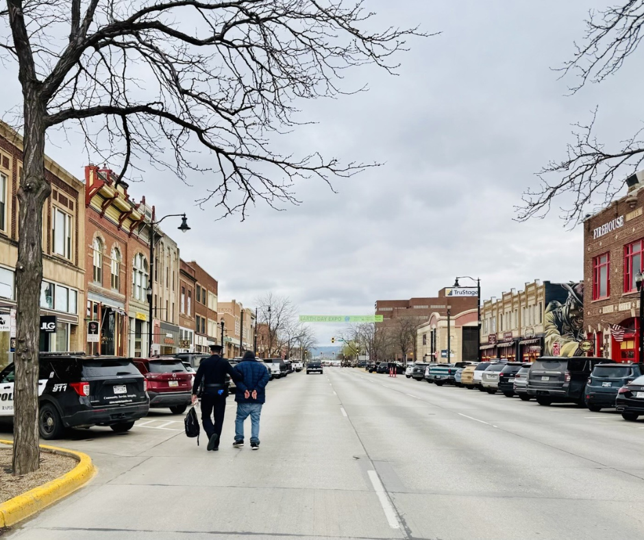 Photo of two people on a street in Rapid City, South Dakota