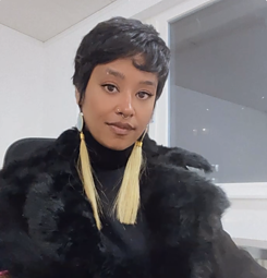 aqui Thami (headshot)