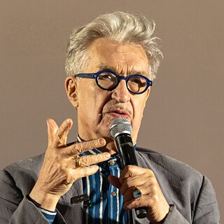 Wim Wenders mit Mikrofon