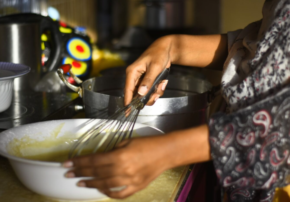 These same hands bake various types of biscuits