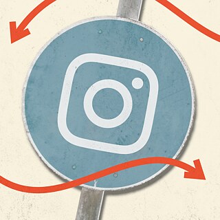 A street sign with the Instagram logo and two red arrows