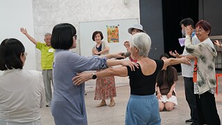 Participants using their bodies to represent mobile phones