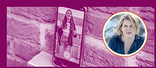 A cell phone leaning against the wall in recording mode, showing a young girl dancing.