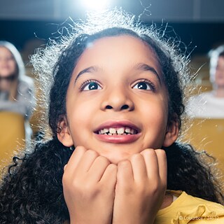 Eine Gruppe von Kinder im Kino