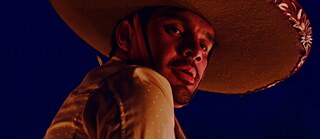 Hombre con sombrero en "Jaripeo" de Efraín Mojica y Rebecca Zweig.