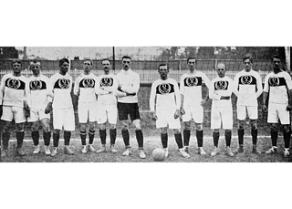 Image of a soccer team in the 1930s standing in a row on the field