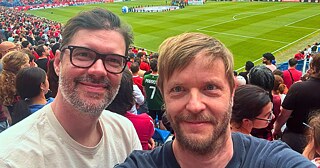 Dennis Kastrup (right) with a friend from Canada at the soccer stadium when Canada played Ireland in a friendly match on June 5