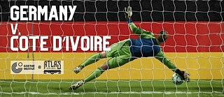 Goalie trying to catch the ball