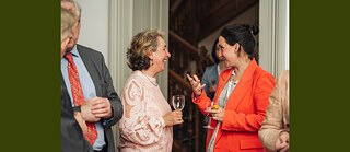 right: Bailie Christy Mearns in conversation