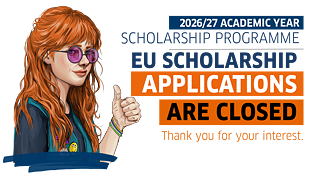 Illustration of a person with long orange hair wearing round purple-tinted glasses, a dark shirt, and a teal vest, raising one hand with a thumbs-up gesture. On the right side, large text reads “2026/27 ACADEMIC YEAR SCHOLARSHIP PROGRAMME,” followed by EU SCHOLARSHIP. An orange banner contains the words APPLICATIONS ARE CLOSED, and below it the text says Thank you for your interest