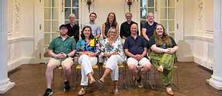 Photo of the Goethe-Institut Boston Team seated in the Grand Hall in two rows