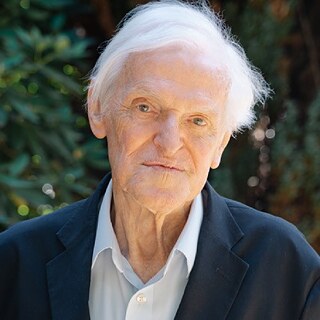 A portraight of a white-haired man