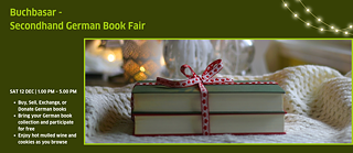 A stack of books held together by a festive christmassy ribbon.