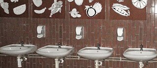 A row of sinks in a bathroom