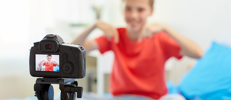 Boy in front of a camera