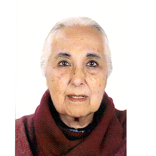 Head shot of Romila Thapar in front of a white backgrond, she has white hair and wears a wine-red turtleneck © © Romila Thapar Romila Thapar