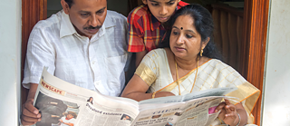 People reading newspaper